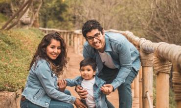 A family posing outside