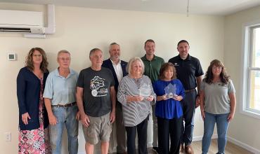The Spindale Neighborhood Revitalization team accepting their awards